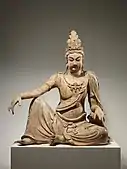 Bodhisattva Avalokiteshvara in water moon form (Shuiyue Guanyin); 11th century; wood (willow) with traces of pigment, multiple-woodblock construction; height: 118.1&nbsp;cm, width: 95.3&nbsp;cm, depth: 71.1&nbsp;cm; Metropolitan Museum of Art