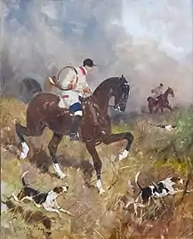Hunting rider with hounds