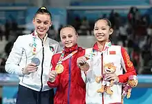 Uneven bars victory ceremony (from left to right): Giorgia Villa (Silver), Ksenia Klimenko (Gold), Tang Xijing (Bronze)