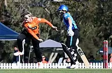 Mills bowling for Perth Scorchers during WBBL
