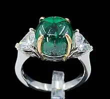 A 5.42 ct. Colombian trapiche emerald, diamond, platinum & 18K yellow gold ring.