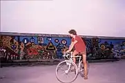 Traffic sign art on Berlin Wall, 1986