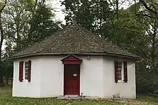 The octagonal school next to the meetinghouse.