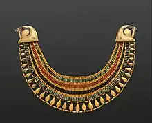 Broad collar of Senebtisi; 1850–1775 BC; faience, gold, carnelian and turquoise; outside diameter: 25&nbsp;cm, maxim width: 7.5&nbsp;cm; Metropolitan Museum of Art