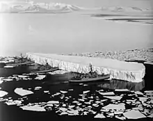 Image 69An iceberg being pushed out of a shipping lane by (L to R) USS&nbsp;Burton Island, USS&nbsp;Atka, and USS&nbsp;Glacier near McMurdo Station, Antarctica, 1965 (from Southern Ocean)