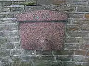 Charles P Melly former wall drinking fountain (1859)