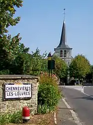 The Rue de Louvres, with a view of the church in Chennevières-lès-Louvres