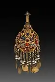 Earring with Vishnu riding Garuda; c. 1600; gold set with jewels and semi-precious stones; overall: 2.6 centimetres (1.0&nbsp;in); from Nepal; Cleveland Museum of Art (Cleveland)