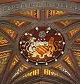 Painted coat of arms of Manchester on the vestibule lierne vault beneath the main tower, Manchester Town Hall, the work of Robert Pollitt
