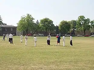 Practising cricket on Kew Green