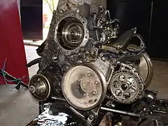 Front-side view of a disassembled OM601 diesel engine.