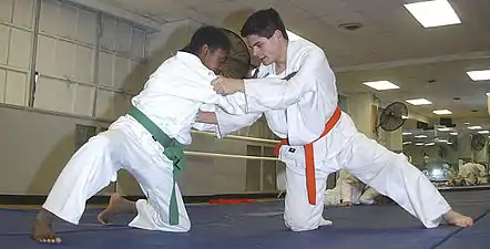 Image 32Two judoka wearing judogi (from Judo)