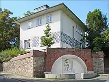 Olbrich's house, reconstructed in a simpler style after it was destroyed in World War II. Only the colored checkerboard design is original.