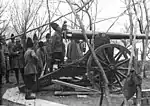 Romanian troops firing a 10.5&nbsp;cm Kanone C/85.