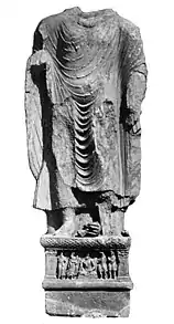 Buddha from Loriyan Tangai with inscription mentionning the "year 318", thought to be 143 CE.