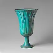 Ancient Egyptian lotiform cup; 1295-1185 BC; faience; height: 15&nbsp;cm, diameter: 9.1&nbsp;cm; Metropolitan Museum of Art (New York City)