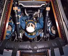 Apollo command module with men inside