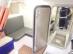 Seating and watertight door starboard aft