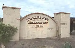 Front gate of the historic Wranglers Roost Stagecoach Stop
