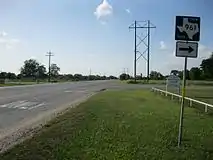 FM 961 begins at Highway 71 in New Taiton. County Road 370 is the road going left.