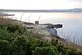 Old Slipway at Innermessan on Loch Ryan, Inch, Wigtownshire with Stranraer in the background