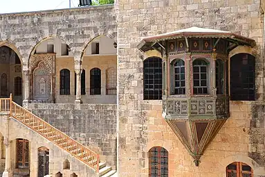 Latticework balcony closed in by intricate woodwork