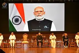 Prime Minister of India H.E. Narendra Modi addressing the gathering at the inauguration of Sai Hira Global Convention Centre
