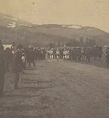 Spectators watch on at the annual Independence Day (United States) foot race in Alma, Colorado, 1800s.