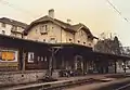 Station building with railway tracks in 1989