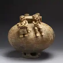 Olla with annular base and modeled figures; 500–1550; ceramic yellow-ware; height: 28.6&nbsp;cm (11.2&nbsp;in); width: 31.8&nbsp;cm (12.5&nbsp;in); Walters Art Museum (Baltimore, USA)