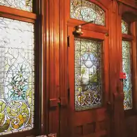 Stained glass side door of the 1890 House