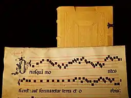 Still life with parchment and book in candle light, ISO speed&nbsp;=&nbsp;200, exposure time&nbsp;=&nbsp;1.3&nbsp;s, exposure value&nbsp;=&nbsp;-1. The illuminance level on the parchment was below 1&nbsp;lux.