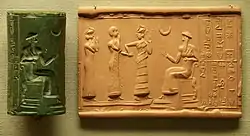 Sumerian cylinder seal and impression, dated c. 2100 BC, of Ḫašḫamer, ensi (governor) of Iškun-Sin c. 2100 BC. The seated figure is probably king Ur-Nammu, bestowing the governorship on Ḫašḫamer, who is led before him by Lamma (protective goddess)..mw-parser-output cite.citation{font-style:inherit;word-wrap:break-word}.mw-parser-output .citation q{quotes:"\"""\"""'""'"}.mw-parser-output .citation:target{background-color:rgba(0,127,255,0.133)}.mw-parser-output .id-lock-free a,.mw-parser-output .citation .cs1-lock-free a{background:url("//upload.wikimedia.org/wikipedia/commons/6/65/Lock-green.svg")right 0.1em center/9px no-repeat}.mw-parser-output .id-lock-limited a,.mw-parser-output .id-lock-registration a,.mw-parser-output .citation .cs1-lock-limited a,.mw-parser-output .citation .cs1-lock-registration a{background:url("//upload.wikimedia.org/wikipedia/commons/d/d6/Lock-gray-alt-2.svg")right 0.1em center/9px no-repeat}.mw-parser-output .id-lock-subscription a,.mw-parser-output .citation .cs1-lock-subscription a{background:url("//upload.wikimedia.org/wikipedia/commons/a/aa/Lock-red-alt-2.svg")right 0.1em center/9px no-repeat}.mw-parser-output .cs1-ws-icon a{background:url("//upload.wikimedia.org/wikipedia/commons/4/4c/Wikisource-logo.svg")right 0.1em center/12px no-repeat}.mw-parser-output .cs1-code{color:inherit;background:inherit;border:none;padding:inherit}.mw-parser-output .cs1-hidden-error{display:none;color:#d33}.mw-parser-output .cs1-visible-error{color:#d33}.mw-parser-output .cs1-maint{display:none;color:#3a3;margin-left:0.3em}.mw-parser-output .cs1-format{font-size:95%}.mw-parser-output .cs1-kern-left{padding-left:0.2em}.mw-parser-output .cs1-kern-right{padding-right:0.2em}.mw-parser-output .citation .mw-selflink{font-weight:inherit}"Cylinder vase". Collections Search – Museum of Fine Arts, Boston. 20 May 1987. Archived from the original on 11 November 2021. Retrieved 11 November 2021.
