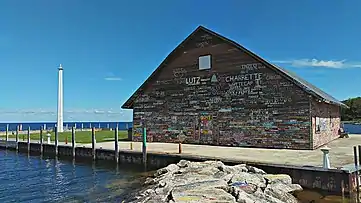 Anderson Dock; graffiti is permitted on the warehouse building within certain limits.