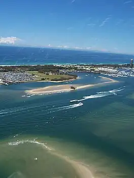 View from a helicopter over Southport across the Broadwater to Main Beach and the Pacific Ocean beyond, 2006