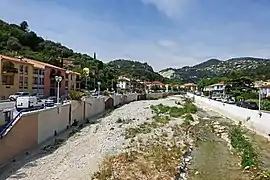 A view of the river flowing through the village